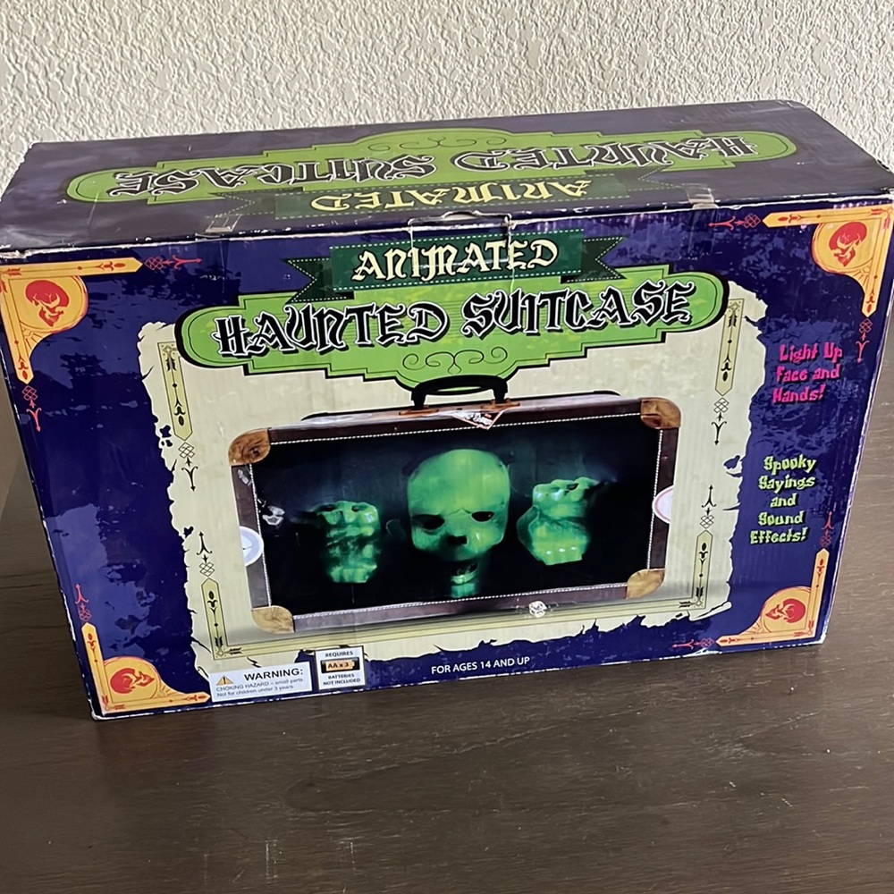 Animated Haunted suitcase Halloween decor